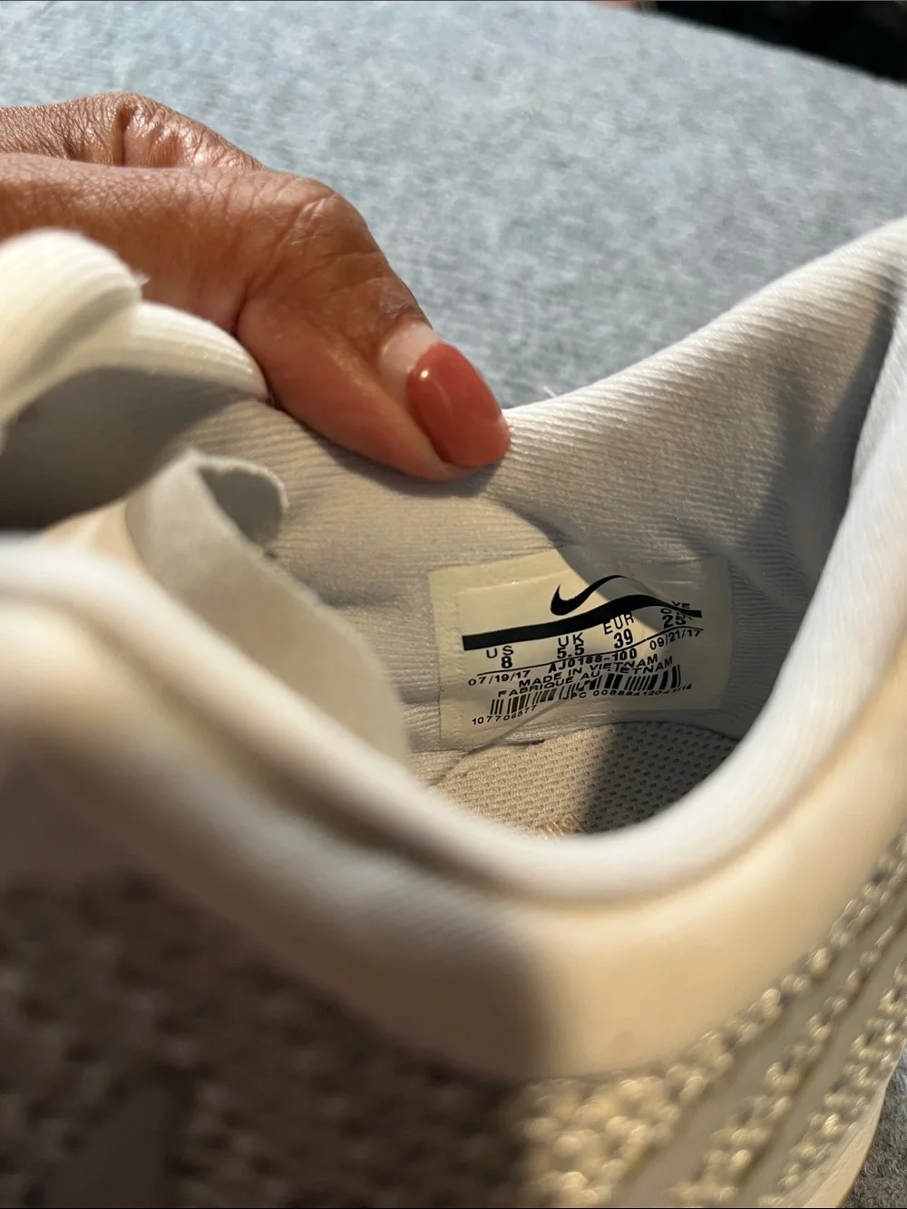 Nike Women’s White and Light Gray Zoom Running Sneakers